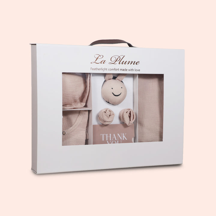 La Plume 7-Piece Muslin Newborn Gift Set | Swaddle, Romper, Bib, Washcloths, Pillow &amp; Soft Toy