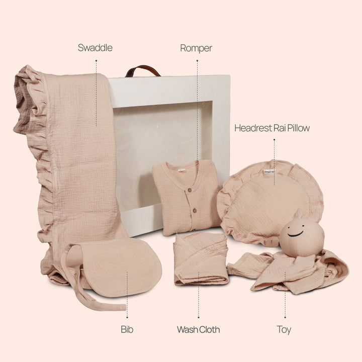 La Plume 7-Piece Muslin Newborn Gift Set | Swaddle, Romper, Bib, Washcloths, Pillow &amp; Soft Toy