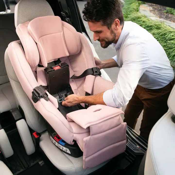 Nuna rava™ car seat showing car installation
