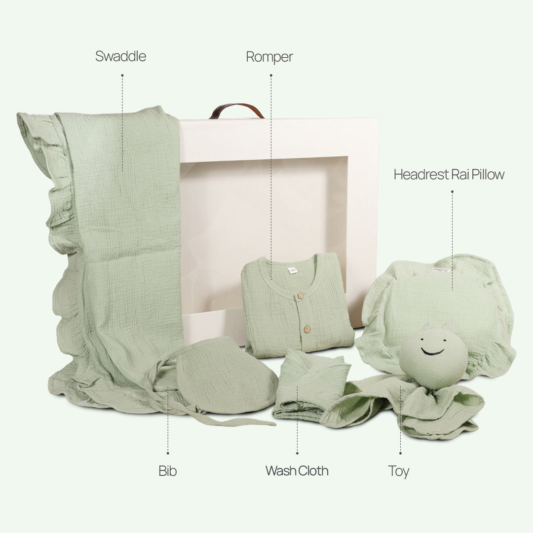 La Plume 7-Piece Muslin Newborn Gift Set | Swaddle, Romper, Bib, Washcloths, Pillow &amp; Soft Toy