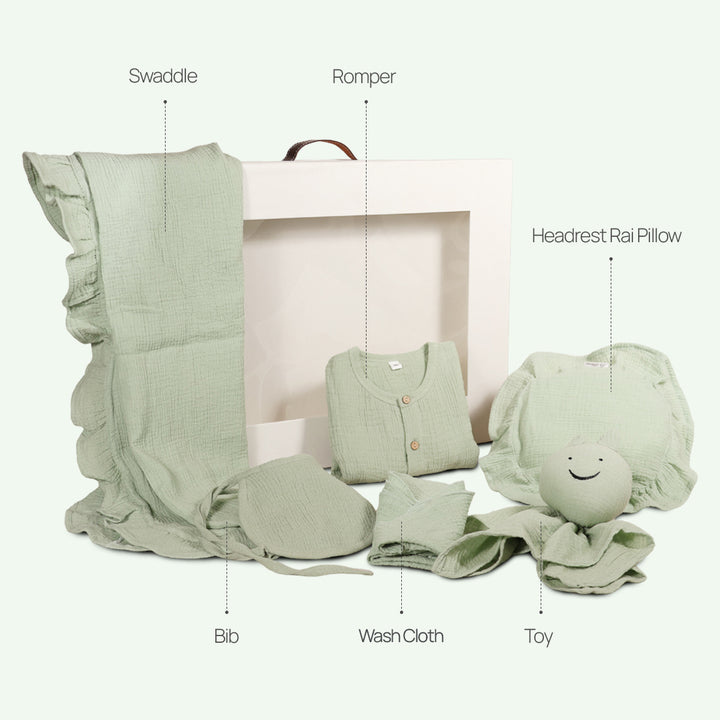 La Plume 7-Piece Muslin Newborn Gift Set | Swaddle, Romper, Bib, Washcloths, Pillow &amp; Soft Toy