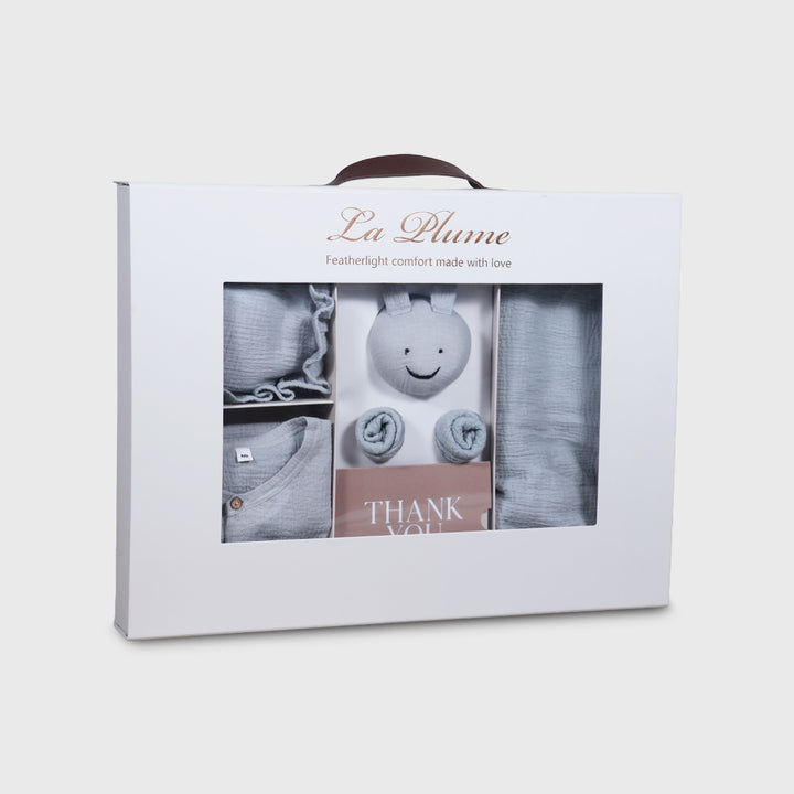 La Plume 7-Piece Muslin Newborn Gift Set | Swaddle, Romper, Bib, Washcloths, Pillow &amp; Soft Toy