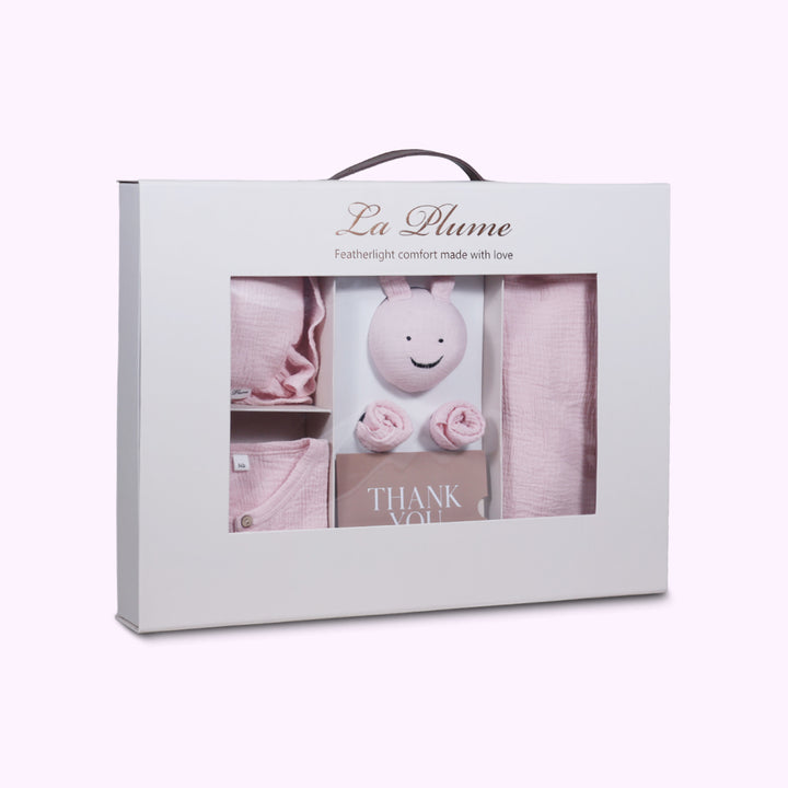 La Plume 7-Piece Muslin Newborn Gift Set | Swaddle, Romper, Bib, Washcloths, Pillow &amp; Soft Toy